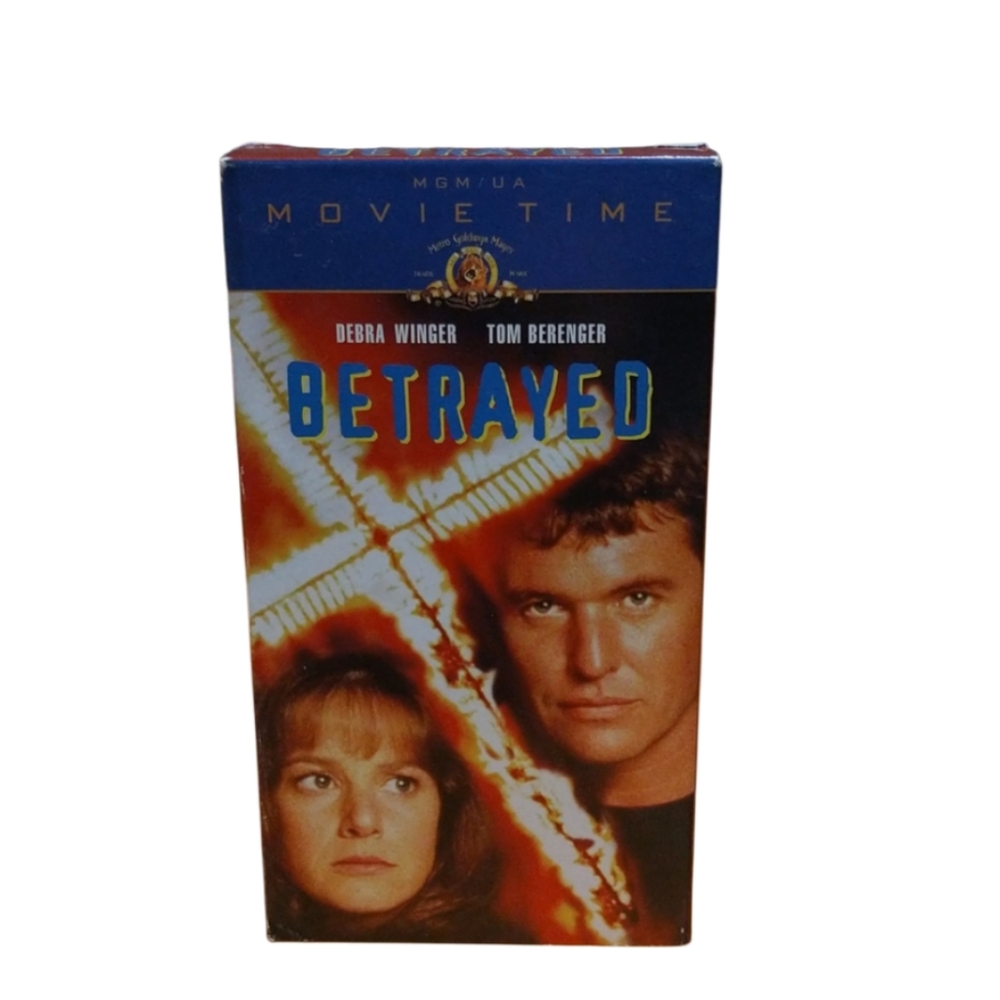 Betrayed action thriller VHS tape
